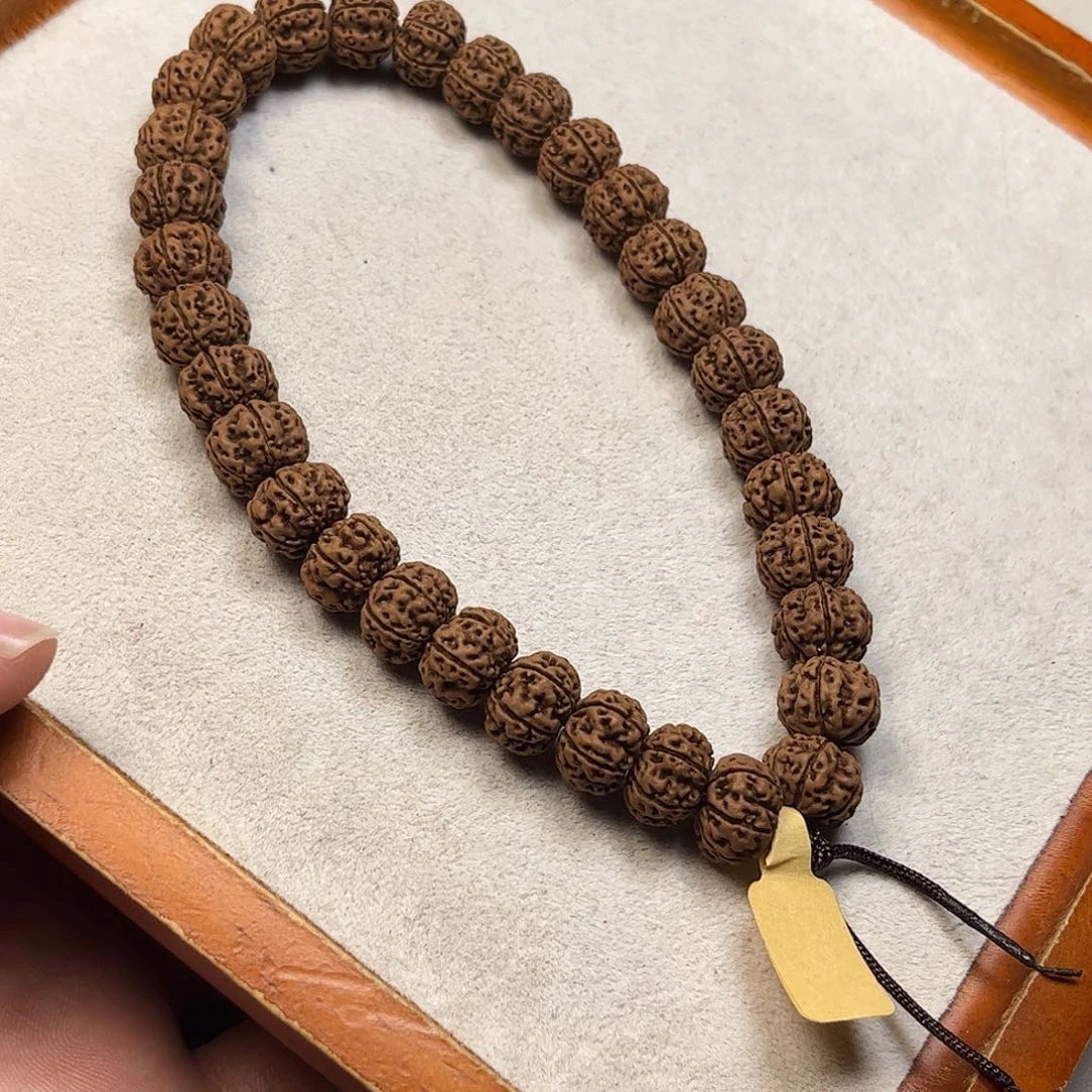 董***董金刚菩提手串凹底梅花