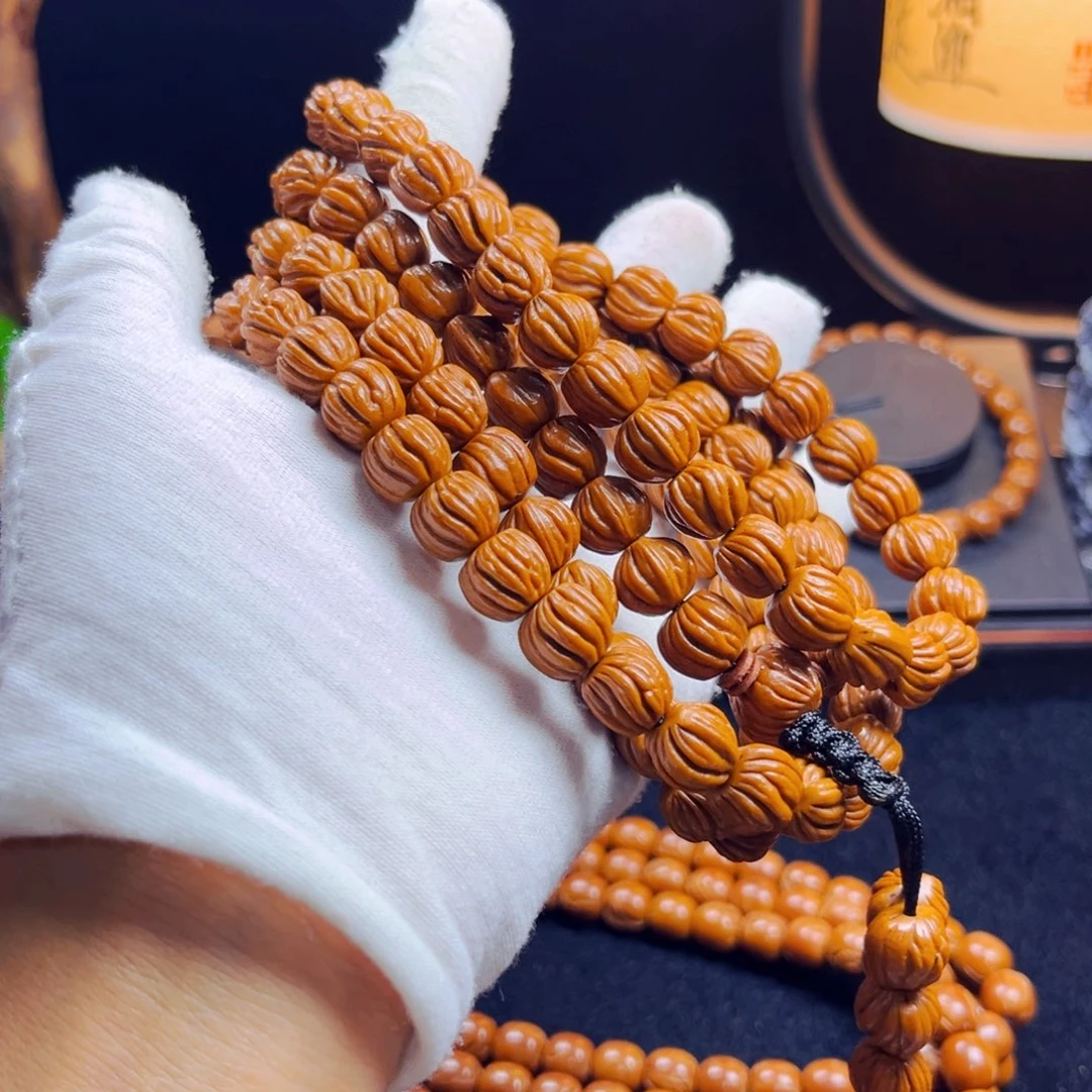 琼***饭桃核吊坠野生桃核