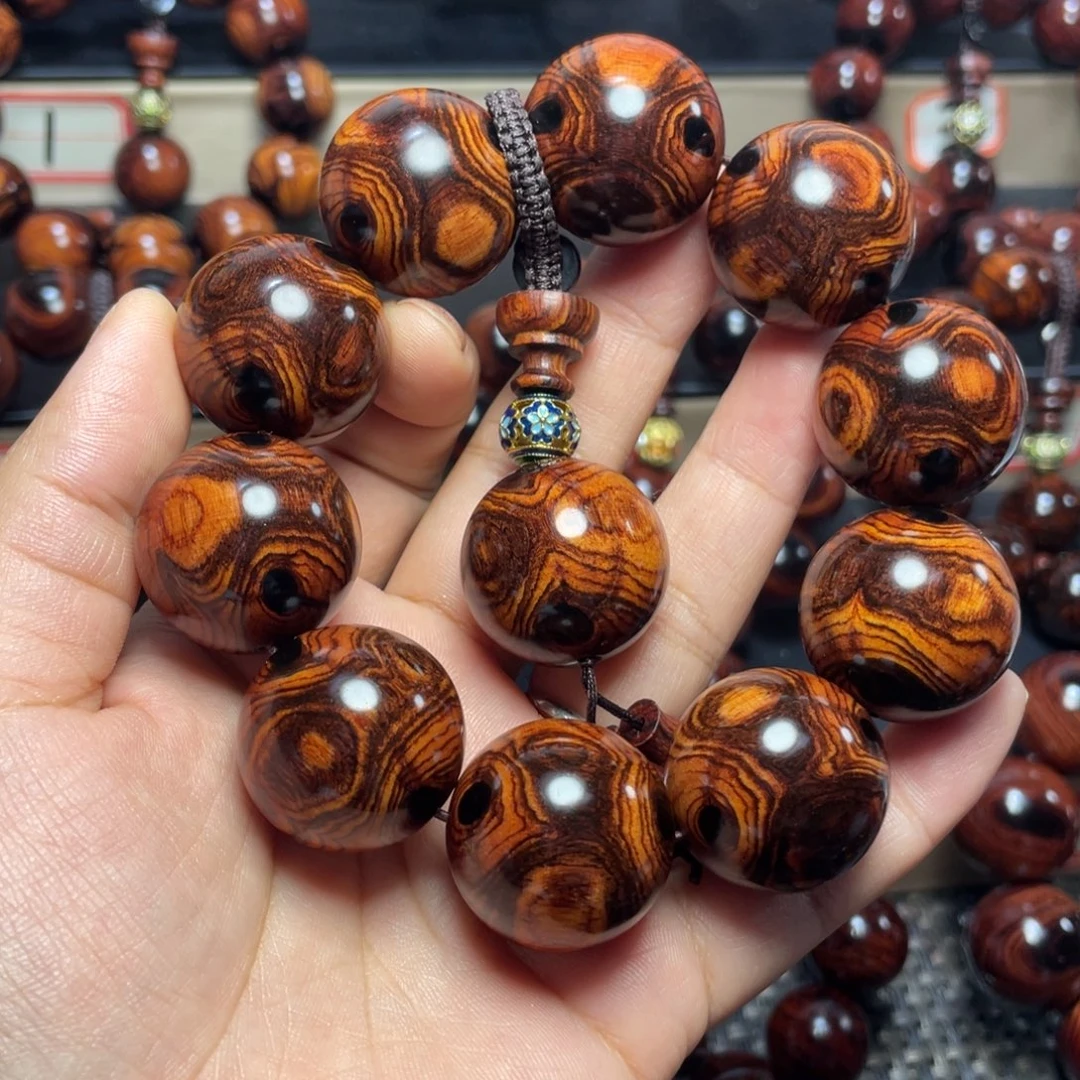 天***一花梨木类2.5鬼脸对眼