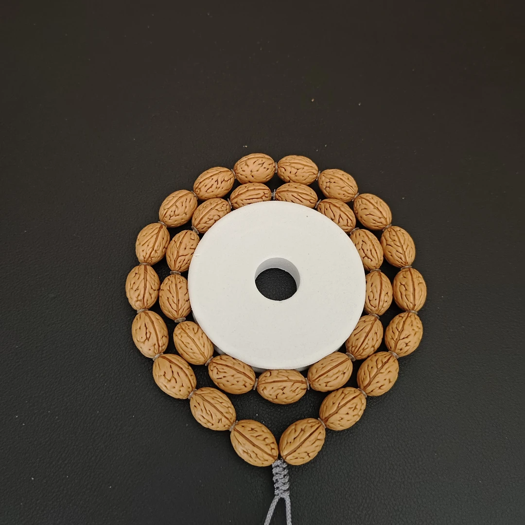 精品桃核手串，手持，非实拍，请在播间选品截图！