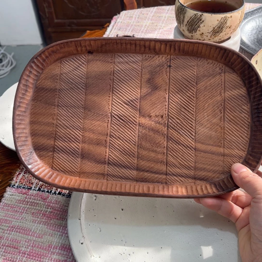 陶黑胡桃整木雕刻长盘