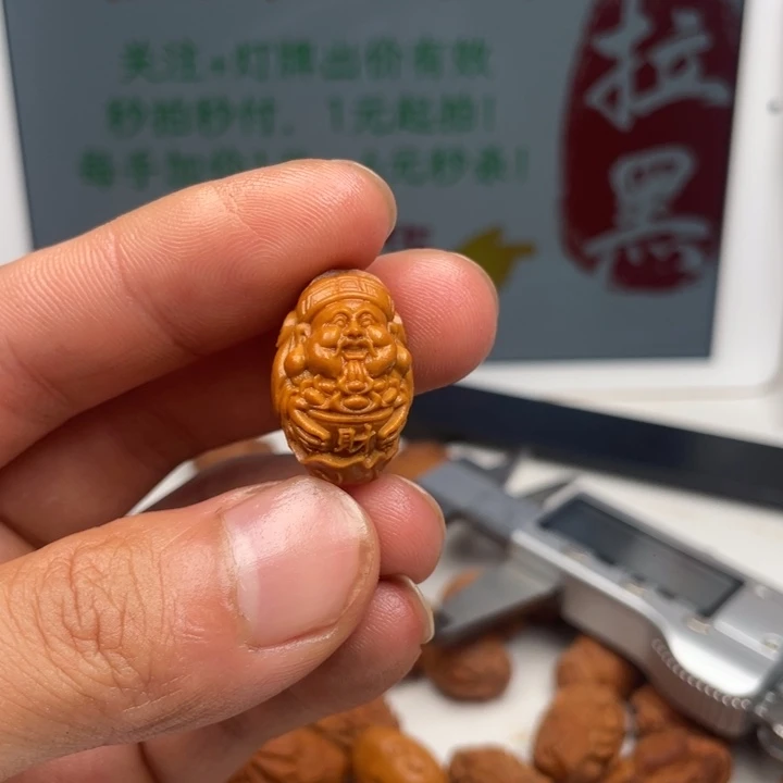 橄榄核吊坠橄榄核雕刻单子。