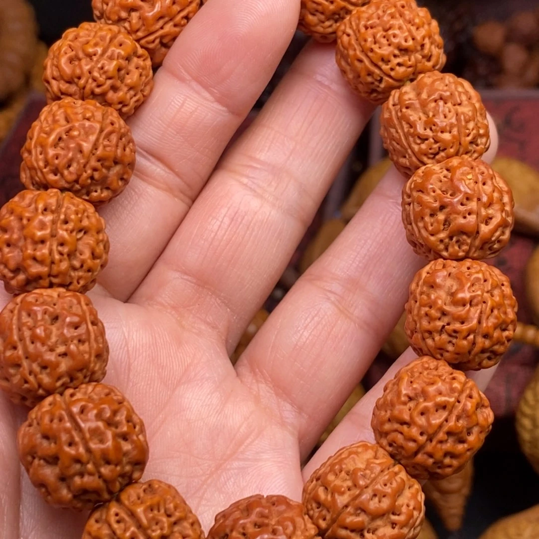 滮***哥橄榄核吊坠橄榄核雕刻手串