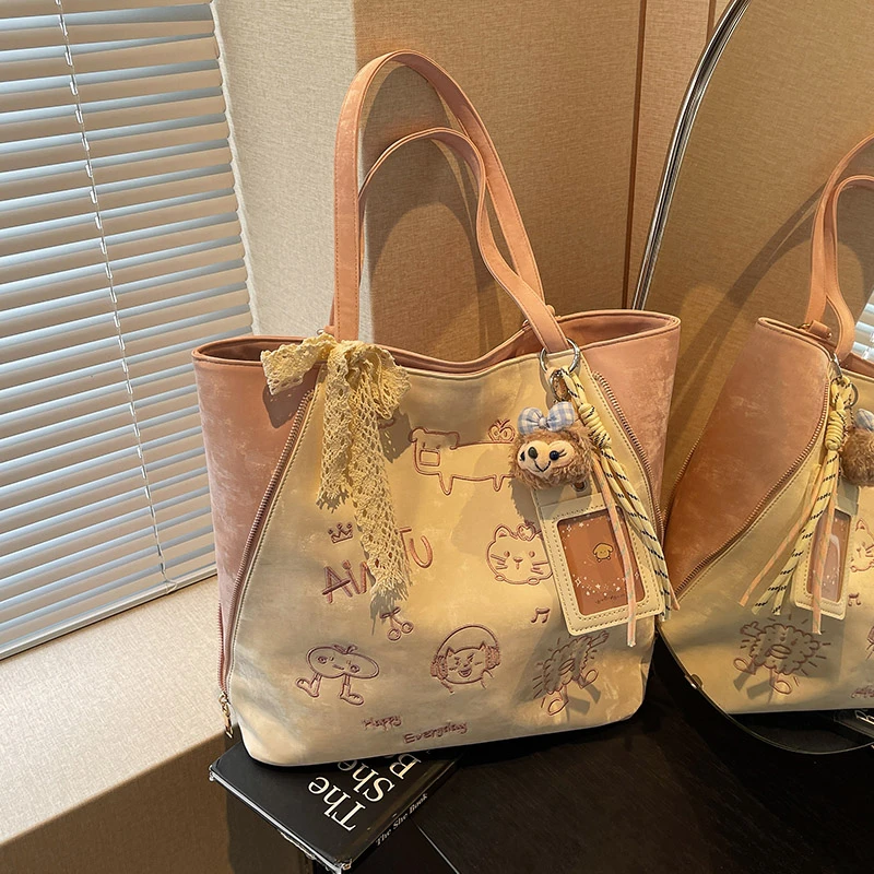 艾米兔女包2026新款简约大容量双肩包百搭休闲小众通勤单肩托特包