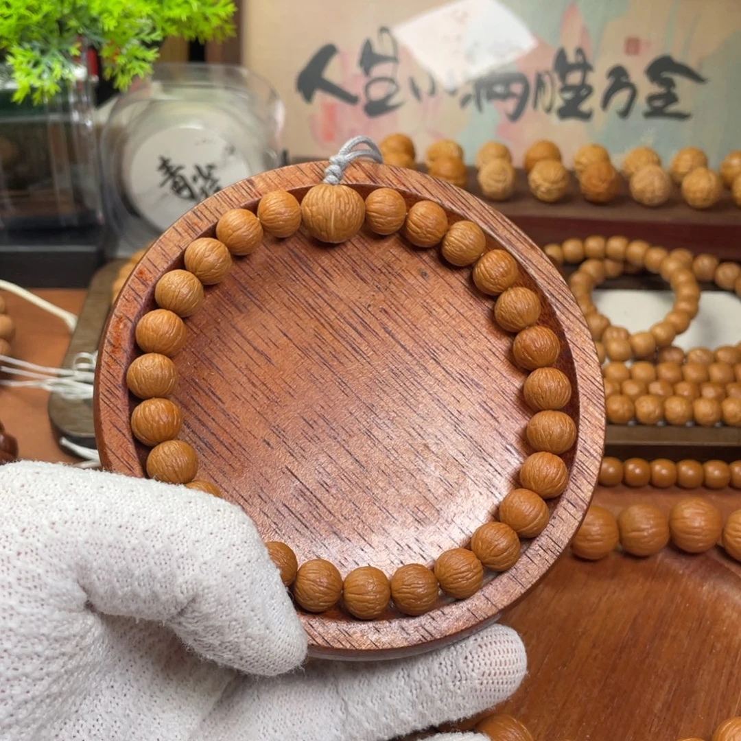 晚***.手串猴头核桃凤羽