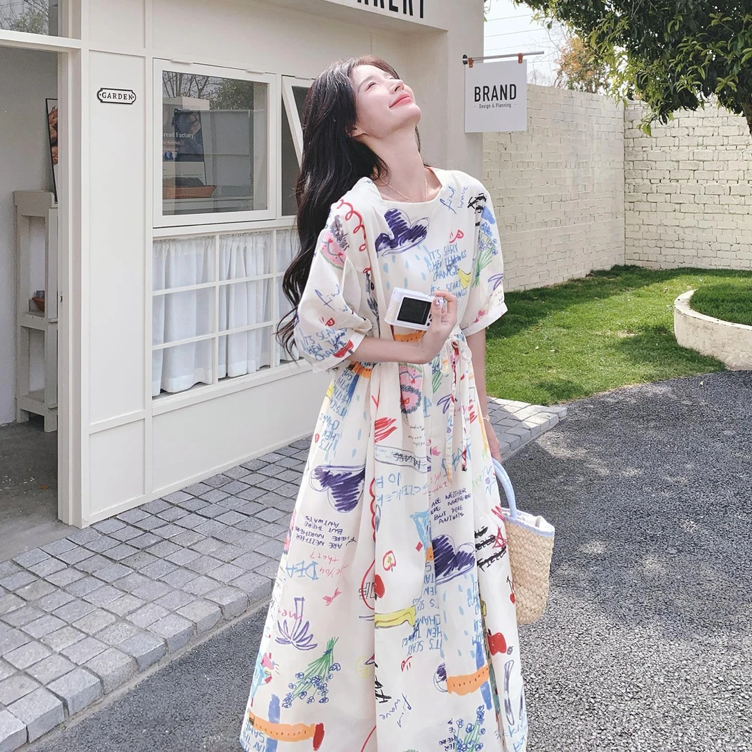 卡通涂鸦连衣裙女2025夏季新款时尚气质宽松设计感拼接超好看长裙