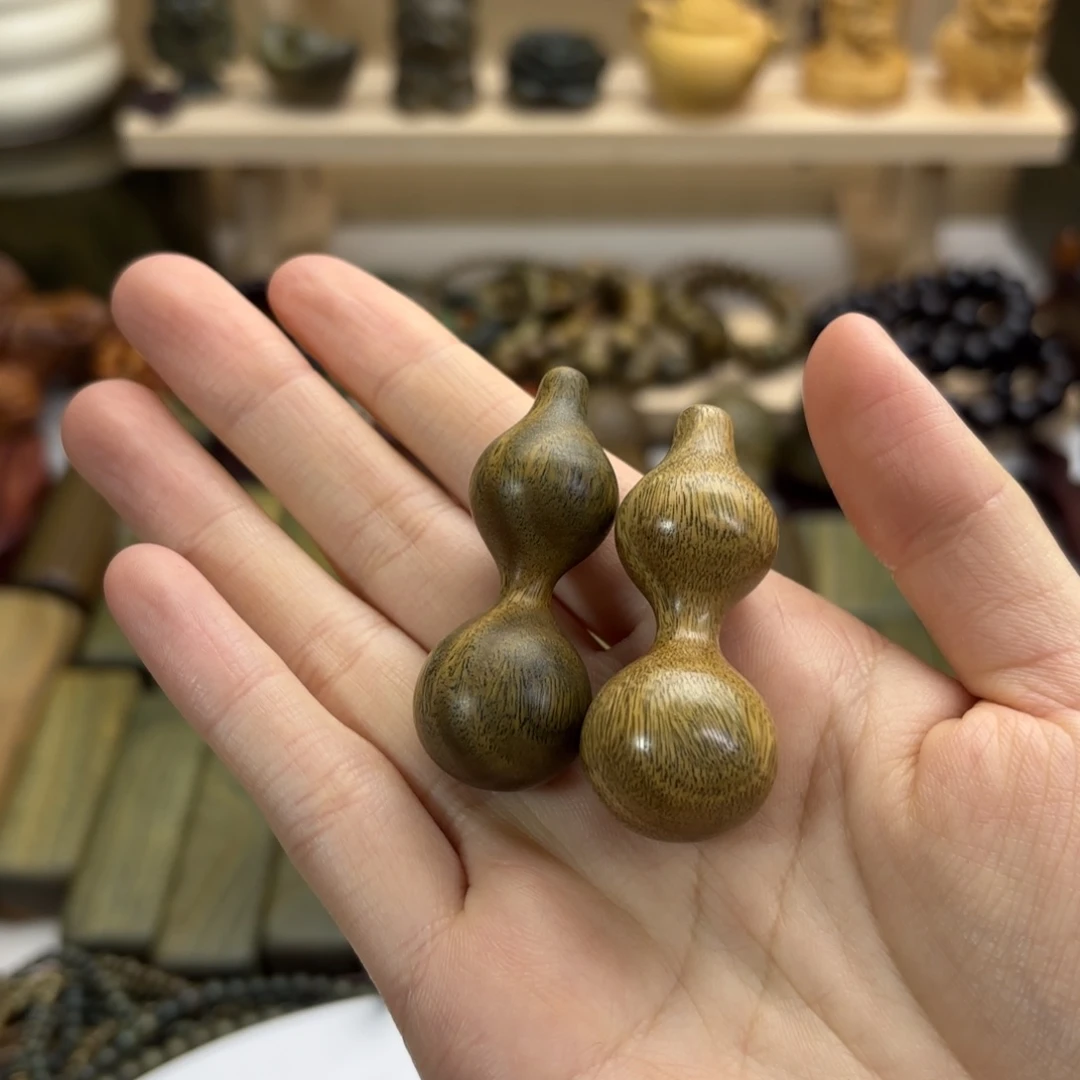 兴***卷木绿檀木料工艺品