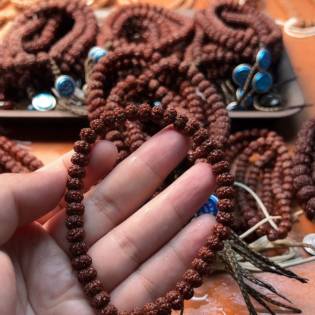 张***章金刚菩提吊坠飞碟树祖手持8