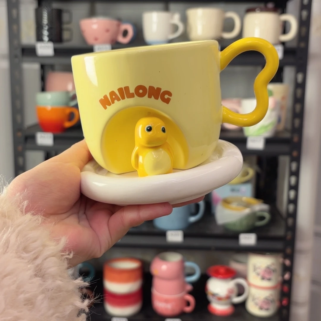 陶瓷双饮款咖**腿奶龙杯碟