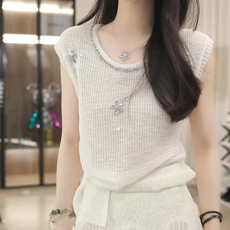 韩系钉珠镂空设计感短袖毛针织衫女士2025夏季独特小众设计感上衣