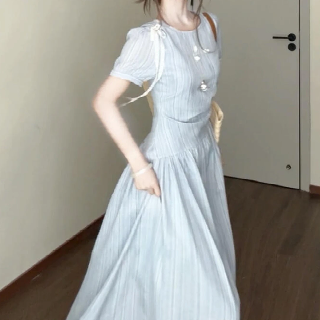 蓝色连衣裙子女夏季2025新款今年流行爆款海边度假巨好看掐腰长裙