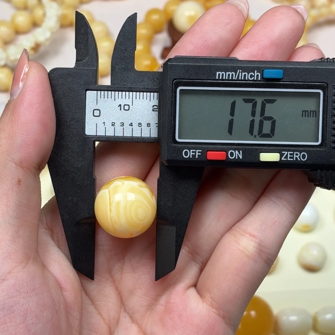 琥珀未镶嵌颈饰焦皮金橘白双瞳单珠