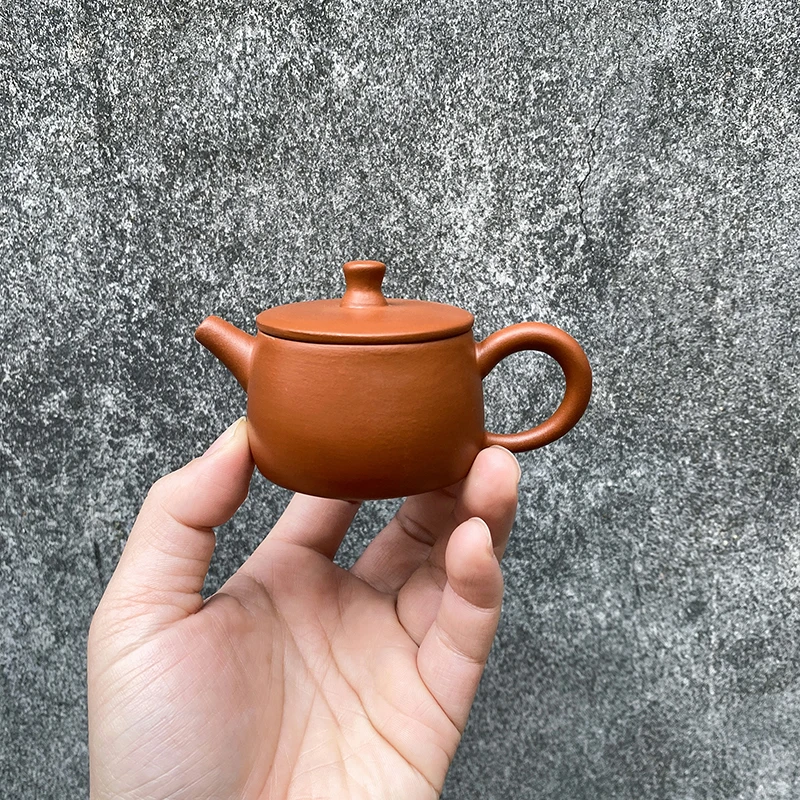 80毫升薄胎炮嘴汉瓦朱泥梅花孔GY