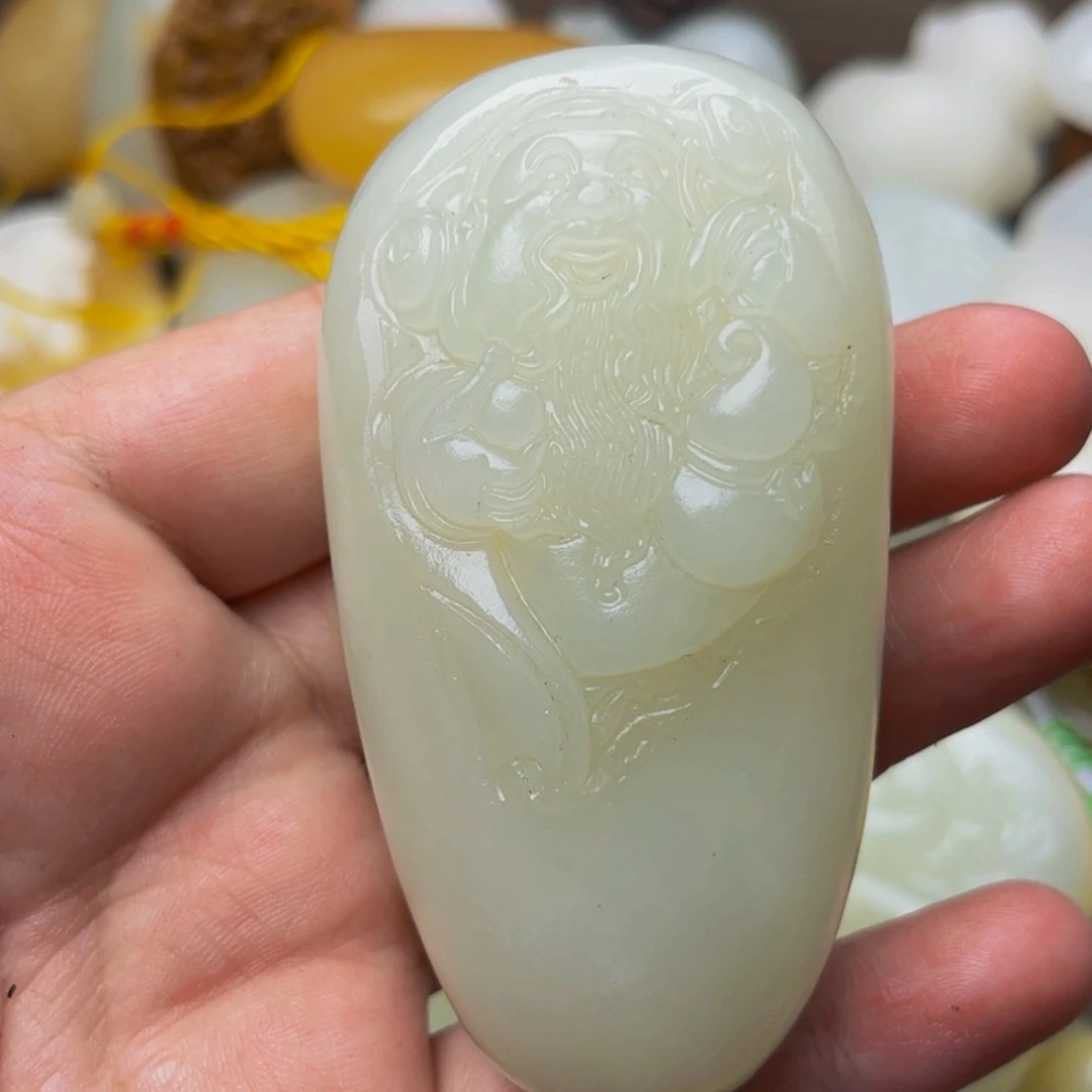 石材方解石手把件财神