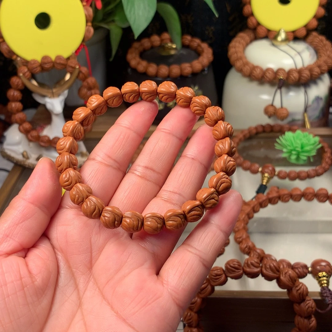 牛***～桃核吊坠金玉龙手串10