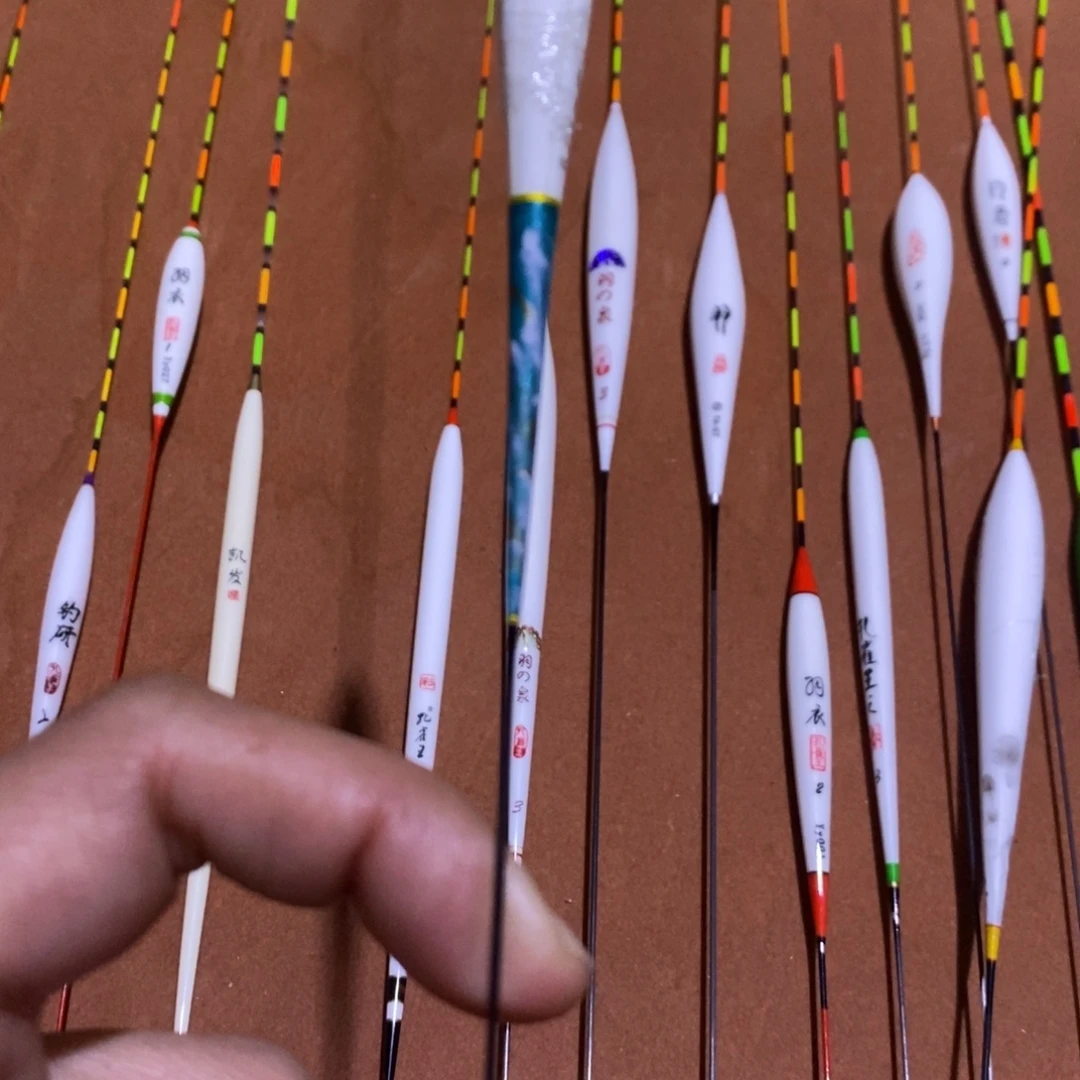 又***烟孔雀羽带壳羽毛一套3支