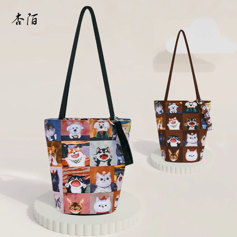 杏陌x2024新款秋冬猫狗拼贴细肩带水桶包单肩包可爱帆布包女