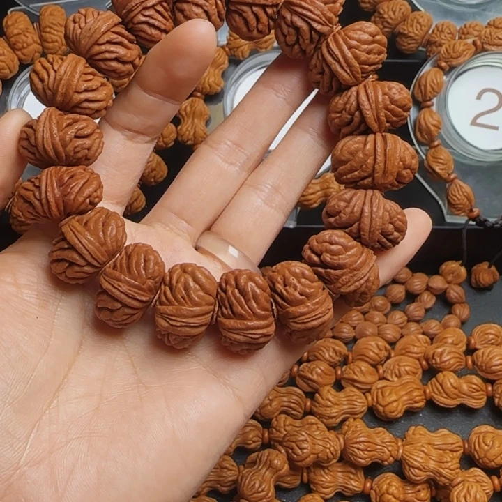 王***人桃核手串龙纹桃核