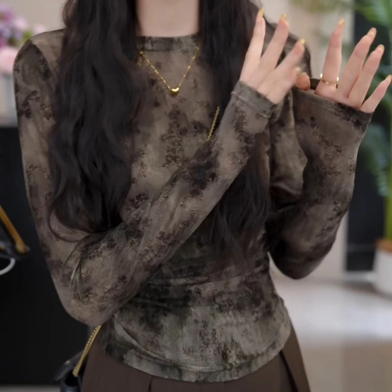 【水木明瑟】2025新款时尚百搭千金风修身印花圆领上衣LK2506866