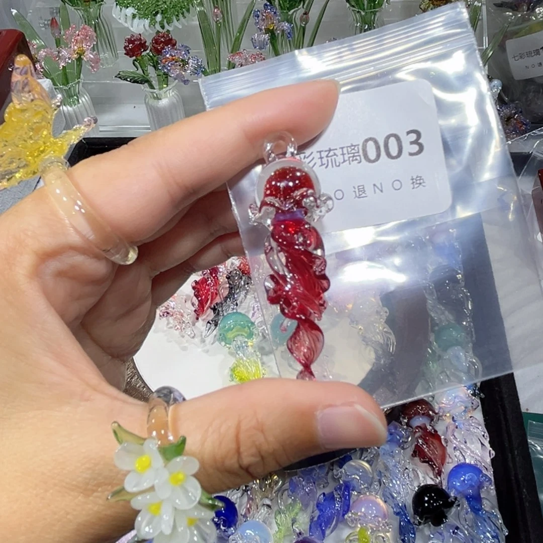 拿***辛玻璃吊坠（不含链）3水母一个