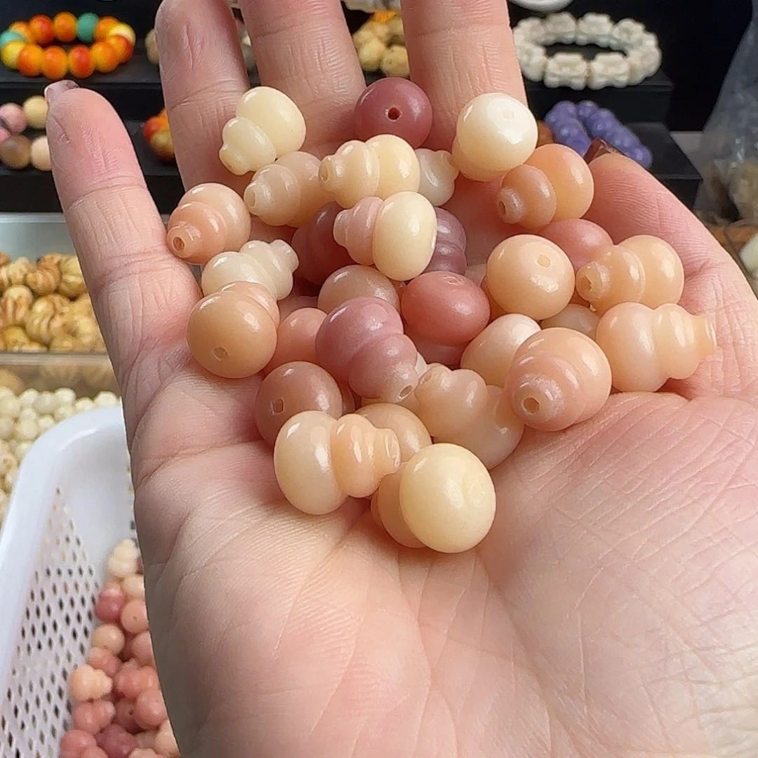 菩提根/象牙果手串瑕疵卡13.6粉葫芦100颗