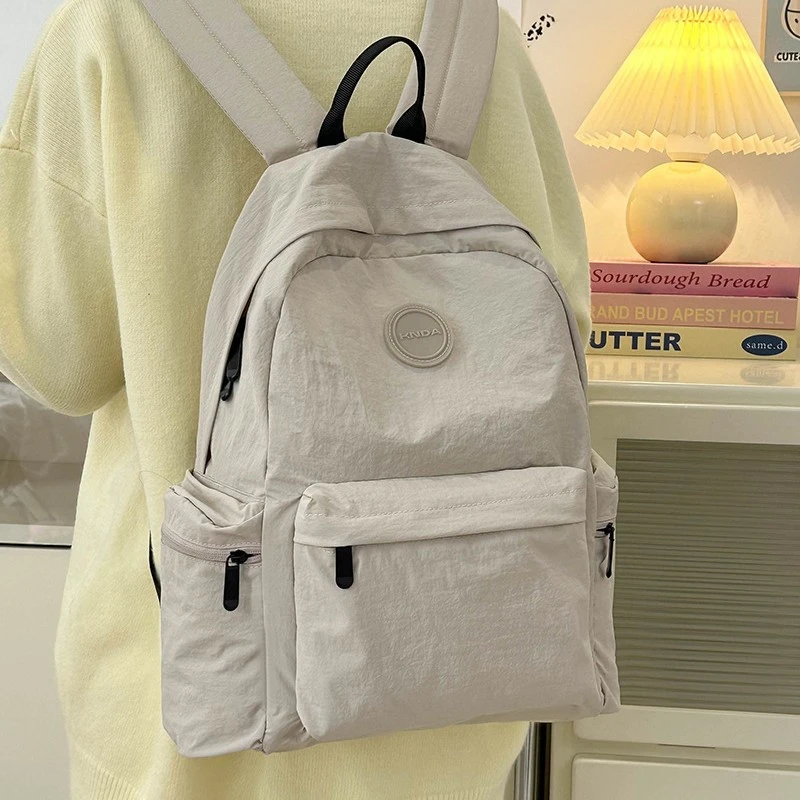 卡汐沐休闲学生书包女大学生小众睿营简约轻便大容量背包高中生双