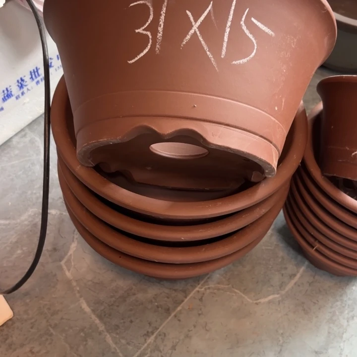 紫砂花盆100-5。          31-15