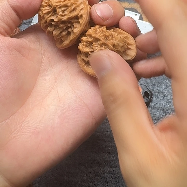 睡***来文玩核桃吊坠刀子