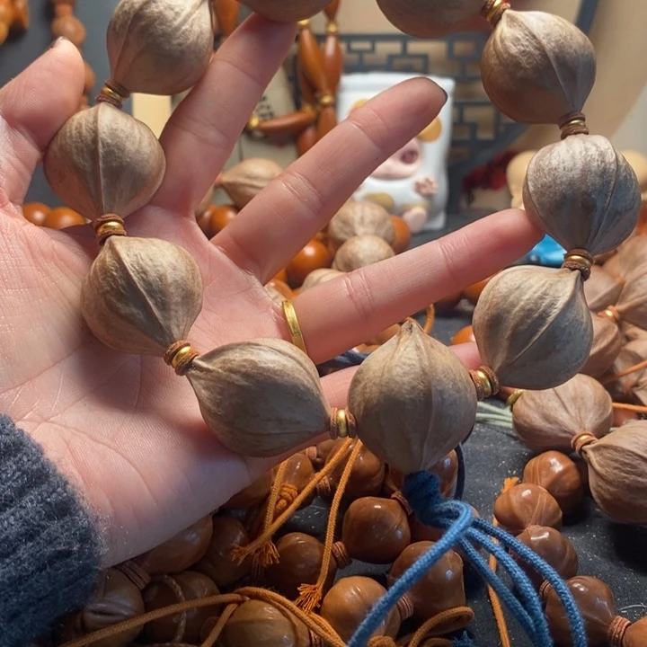 成***子橄榄核手串/手链2.7四花短原皮