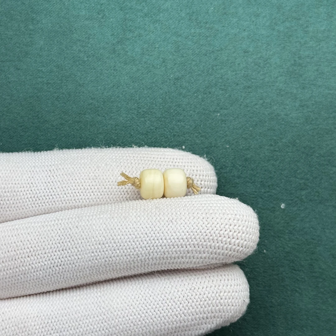 F3310天然原矿蜜蜡 对珠7.6*5.6mm 支持鉴定 假一罚十