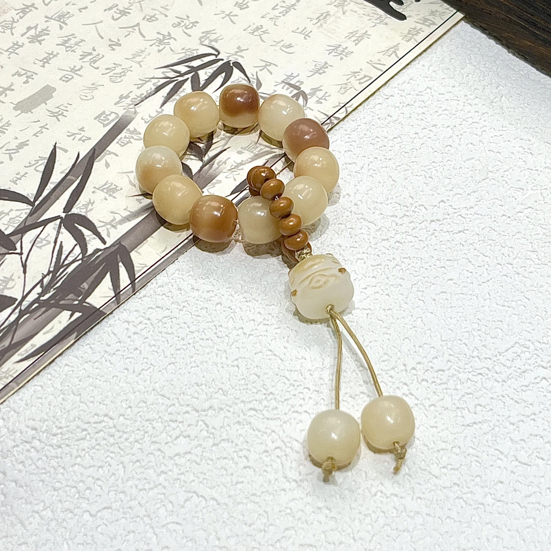 紫罗兰色菩提手捻飘花老型桶菩提手捻10*9mm    G-B043040