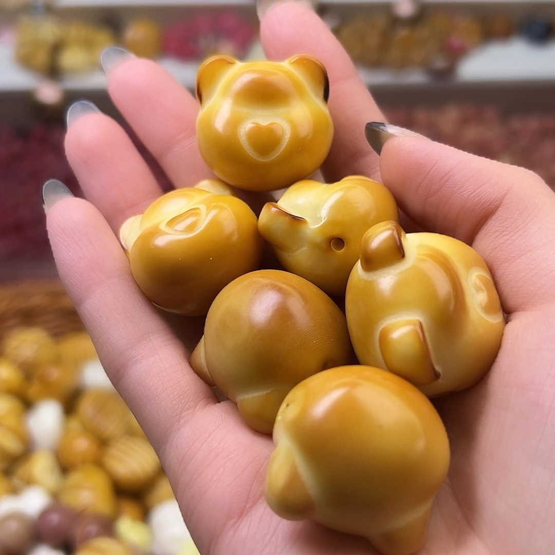 菩提根/象牙果吊坠孔道瑕疵炭烤大熊头2颗