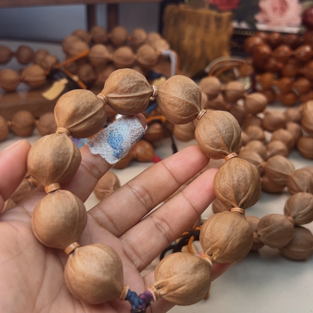 李****手串橄榄核梅林铁核鲨鱼背素串 22×26