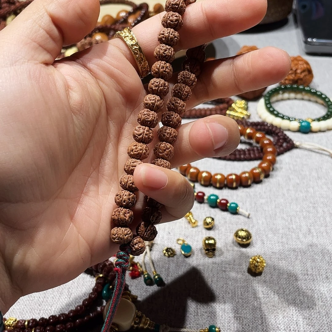 谢***捏金刚菩提吊坠老树王手持10mm