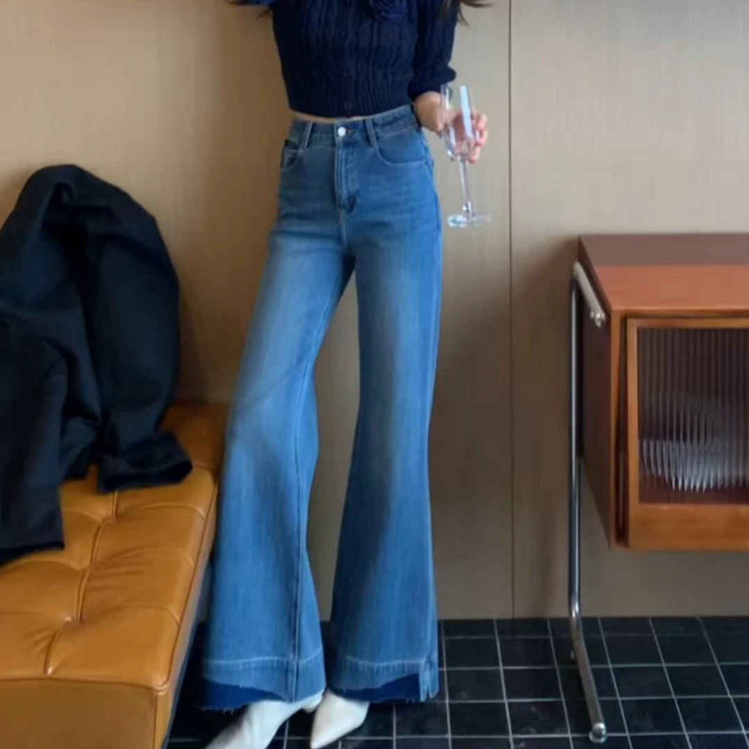 秋季时尚四面弹高腰拼接破边裤脚休闲显瘦微喇牛仔裤