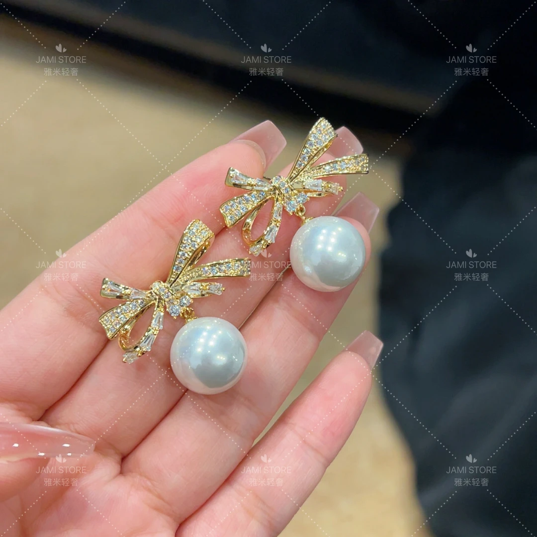 铜合金莫桑石耳饰 【雅米】大蝴蝶结珠珠轻奢耳环甜美气质精致时尚