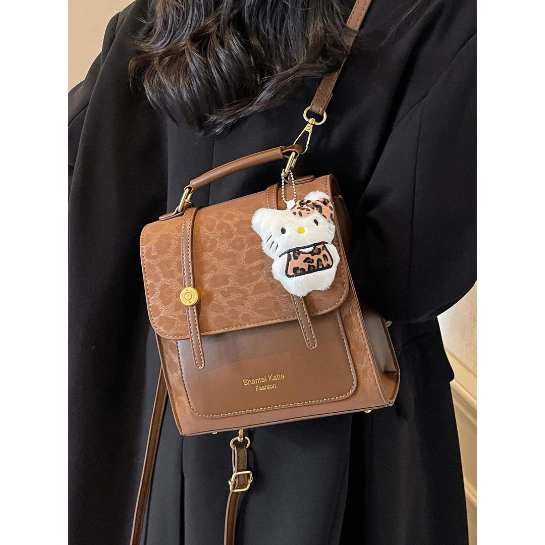 【万达撤柜】大学生旅游背包女2025新款双肩包高级质感复古豹纹书包