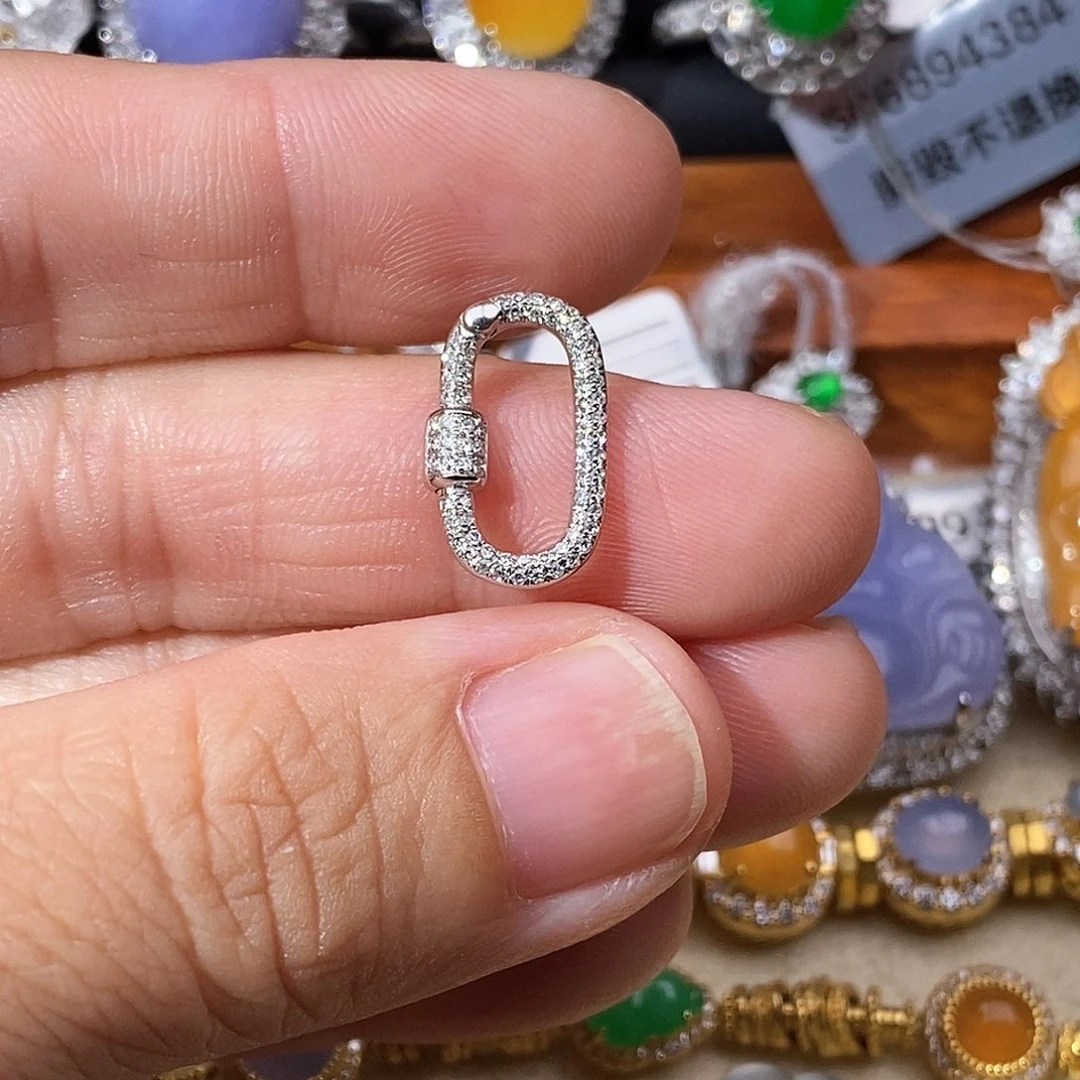 雅***宝扣头钻石18K金镶嵌回型扣