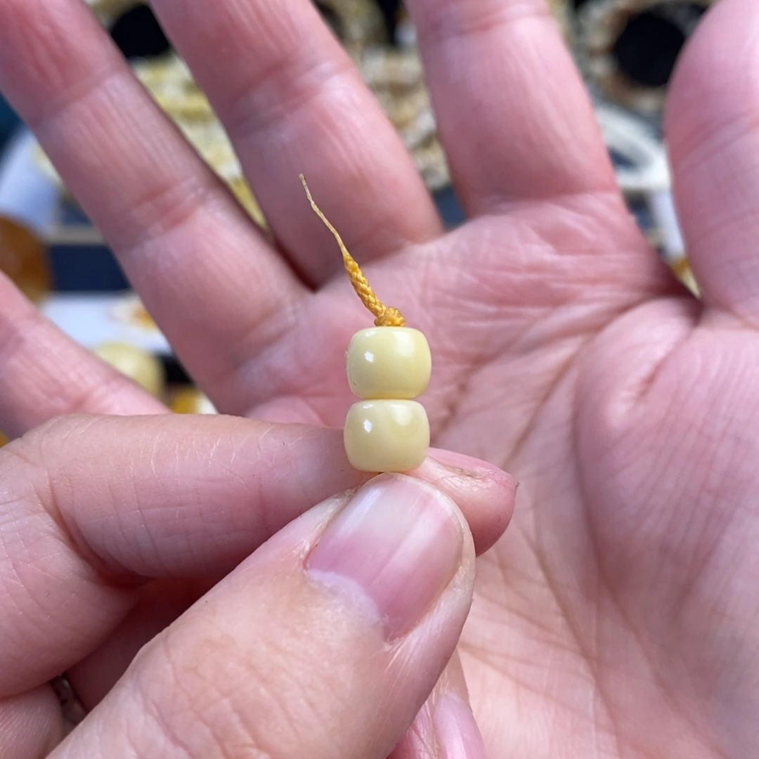 蜜蜡未镶嵌裸石阿尔卑斯奶白老型对珠7.5