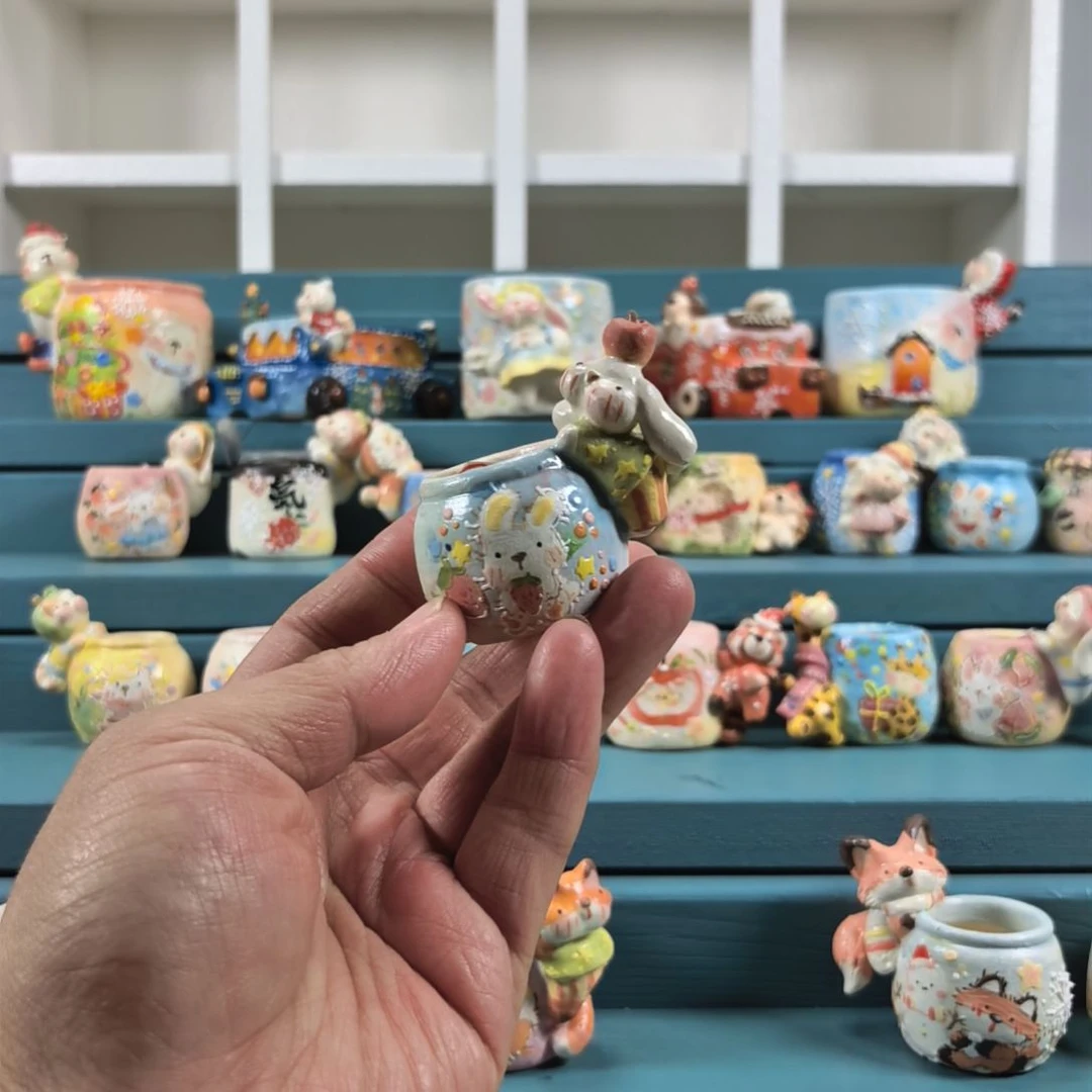 恩****头顶苹果的小兔 手绘多肉花盆