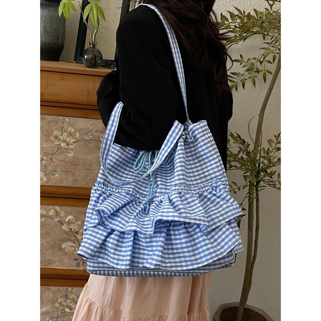条纹帆布包女2025新款韩系休闲单肩包设计感ins风学生通勤托特包
