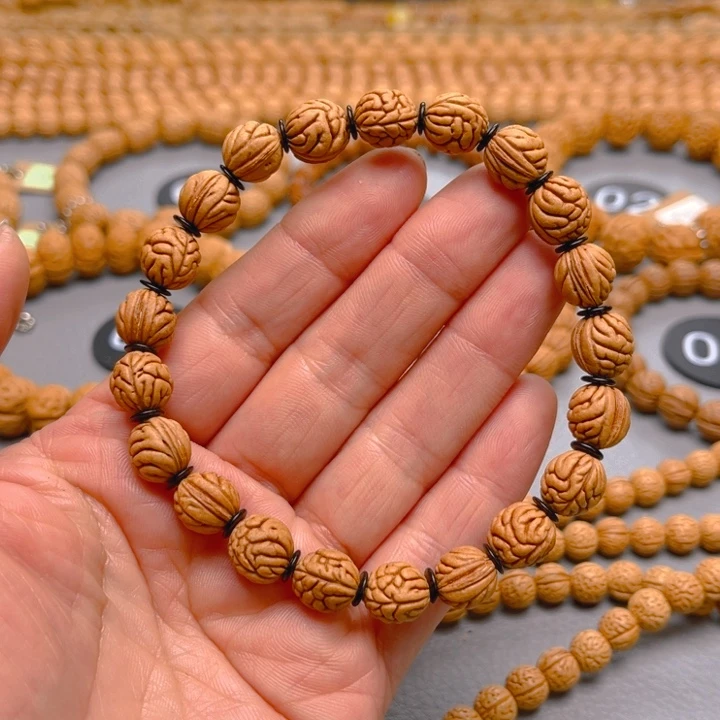 天***涯菩提籽类桃核手串