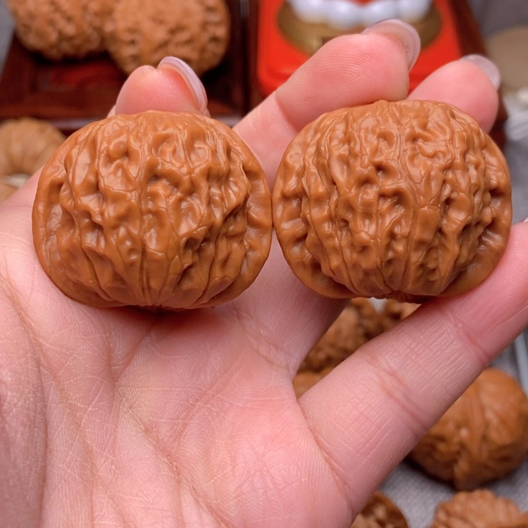 文玩核桃把件毕业红皮元宝元宝38全品