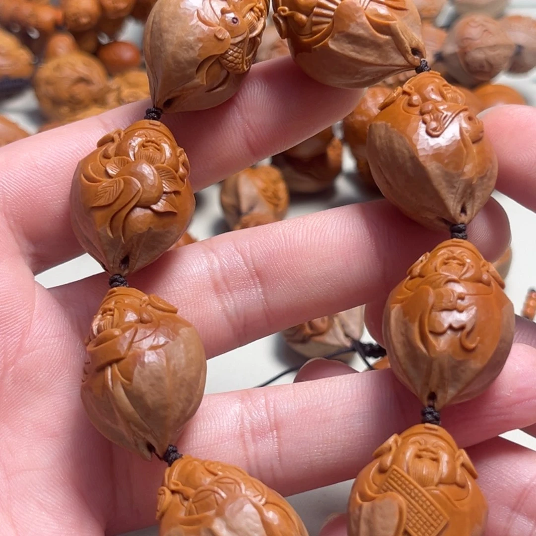 橄榄核吊坠毅纯刀财神