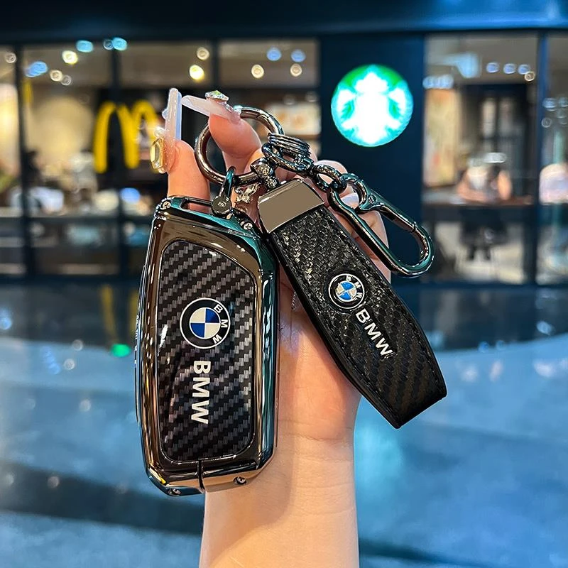 适用宝马X5钥匙套24款新5系X1X7系735liXXMX6iX车金属碳纤纹扣壳