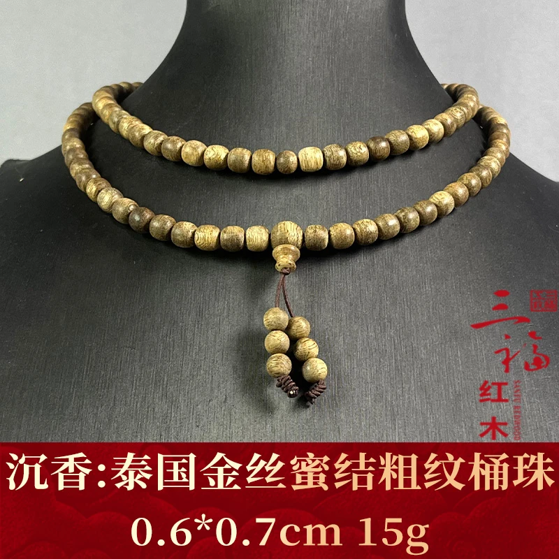 118515   泰国金丝蜜结粗纹桶珠  沉香