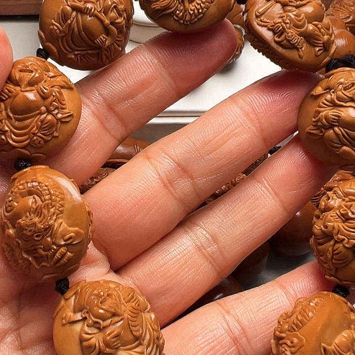 卷***卷橄榄核手串/手链龙财