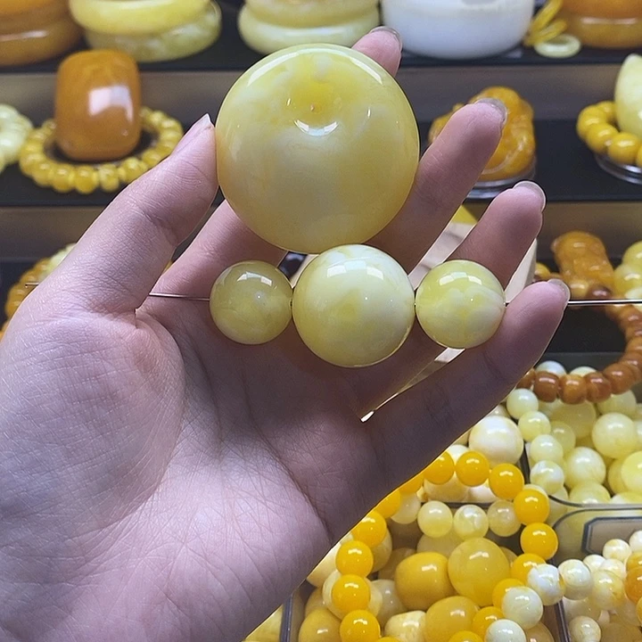 x***5非金属百花蜜大鱼眼扣30单珠20单珠
