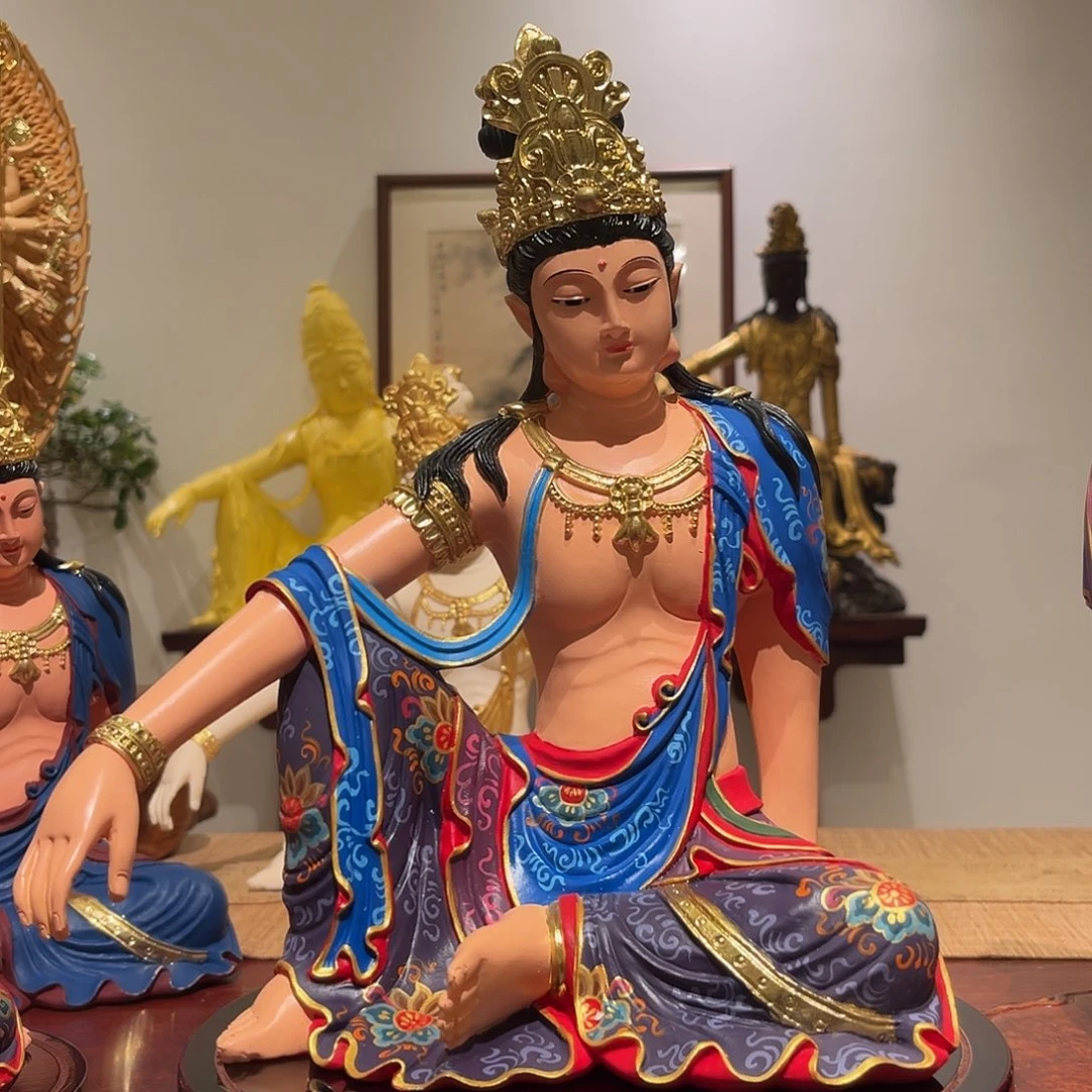 S***7香榧木象牙果蓝大彩自在观音30带底座