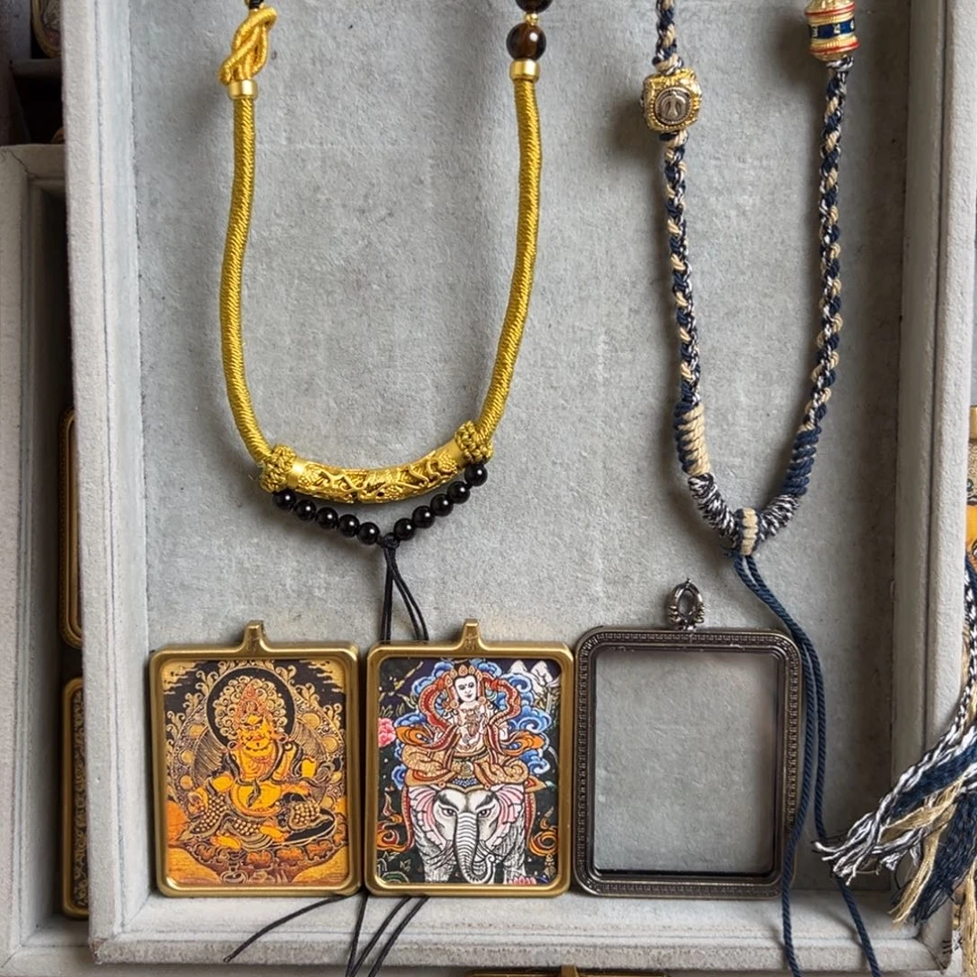 吊坠雪***→双面钛钢黄老爷普贤